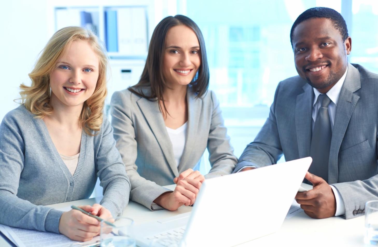 Financial training session with business professionals reviewing company analysis reports